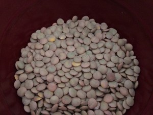Add lentils dry, but washed with water! Like any other veggie, clean them off dab with a paper towel! They will cook in the crockpot!