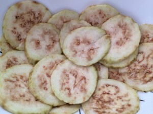 Cut off the ends. Peel off skin. Thinly slice. Sprinkle with salt in a colander for 20 mins. Rinse and pay dry!!