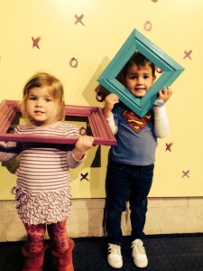 Great Photo Op moms!! Various colored frames and wooden signs saying "I Love You" and "Thank You" against an XOXO printed wall make a fabulous greeting card or a thank you for grandma!