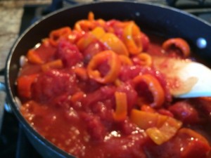Chop up tomatoes as you stir . We like to have some chunks of tomato!