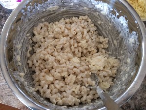 Mix in a large, deep mixing bowl and then spoon into your baking dish. This makes mixing much easier!!