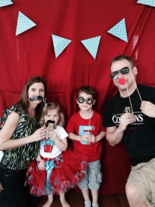 DIY photo booth! Red curtains from Target Clearance rack and a pendant banner finished it off! We hung it on the china cabinet ! It was perfect!!