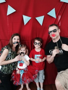 DIY photo booth! Red curtains from Target Clearance rack and a pendant banner finished it off! We hung it on the china cabinet ! It was perfect!! 