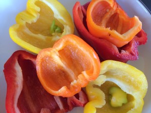 I have seen green and yellow mini peppers inside of red, orange, yellow and green peppers! Even in jalapeños! 