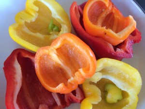 I have seen green and yellow mini peppers inside of red, orange, yellow and green peppers! Even in jalapeƱos!