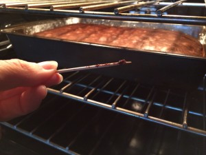 A toothpick In the cake should come our clean of batter. 5 more minutes!