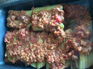 Since my filling contained a tomato base, I did not also make a sauce. I just scooped more filling over the cannelloni before adding the cheese.