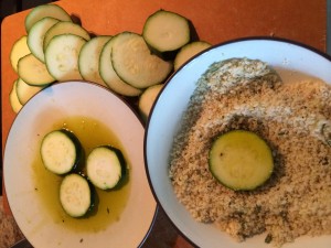 Set up a little assembly line! Dip in olive oil, then cover in Panko mixture, then throw them into the pan!