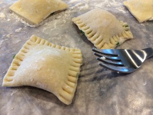 Press hard so that the dough adheres and so that the ravioli wont lose their filling in the water! 