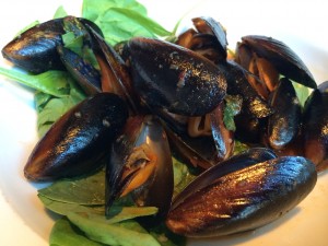 Mussels White wine, garlic, blue cheese, and bacon.