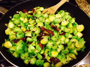 Coat the sprouts in the pan or pour the mixture over the sprouts.